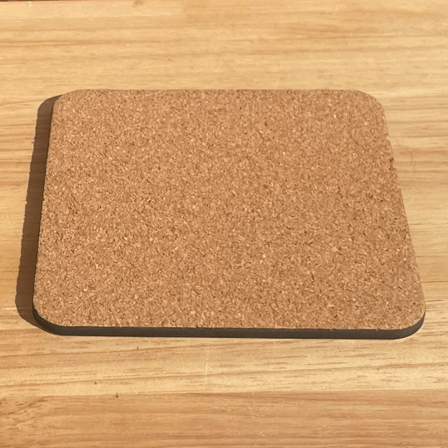 Friesian Cow Coaster, cork backed in Vibrant colours with a glossy finish. 9.8cm x 9.8cm x 0.4cm