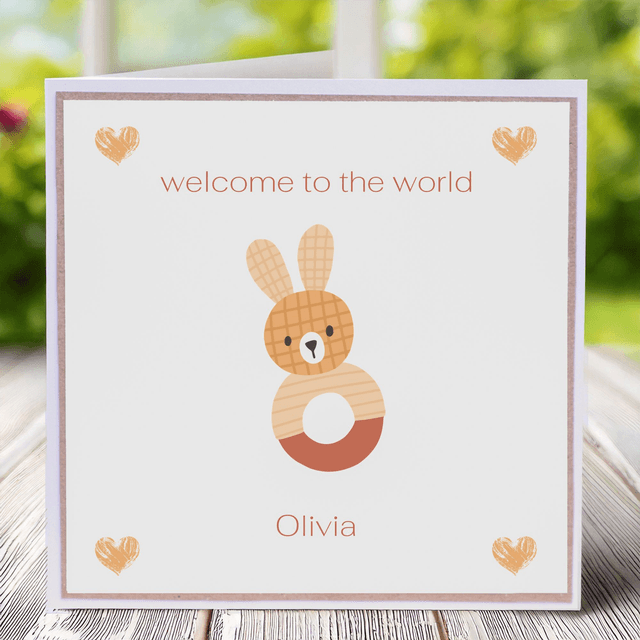 New Baby personalised greetings card with a bunny in soft, neutral tones.